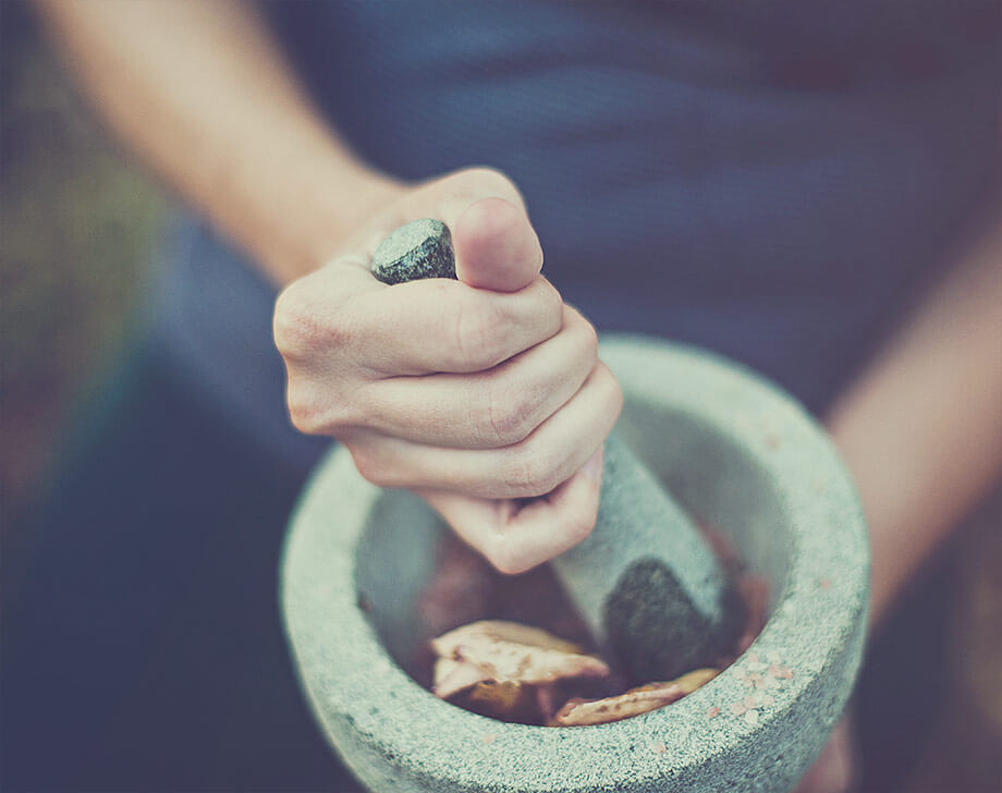 Mortar, is held by woman