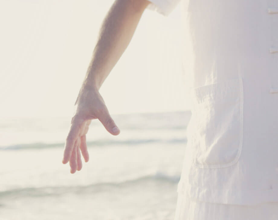 Qi gong pose on the beach