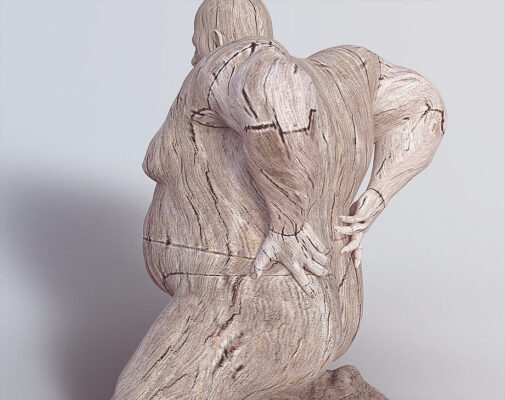 Wooden figure in pose, suggesting back pain