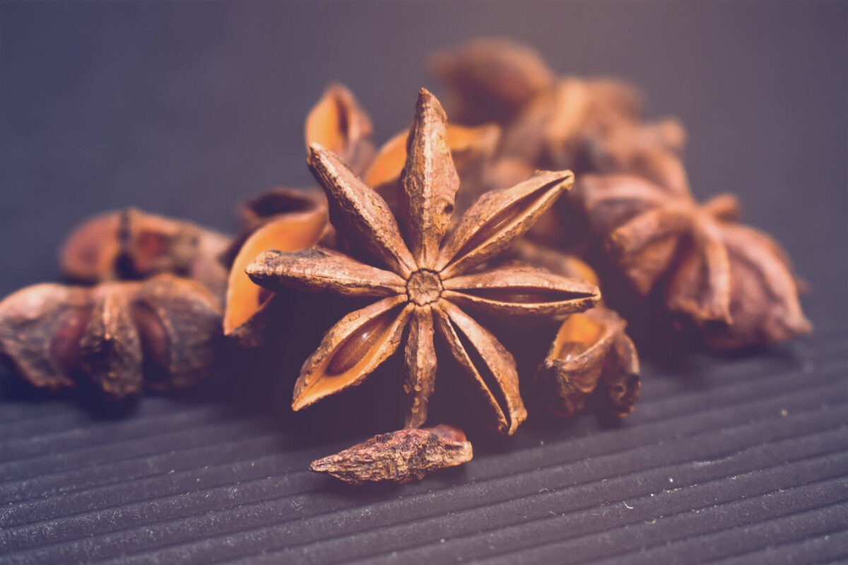 Aniseed stars on a dark background