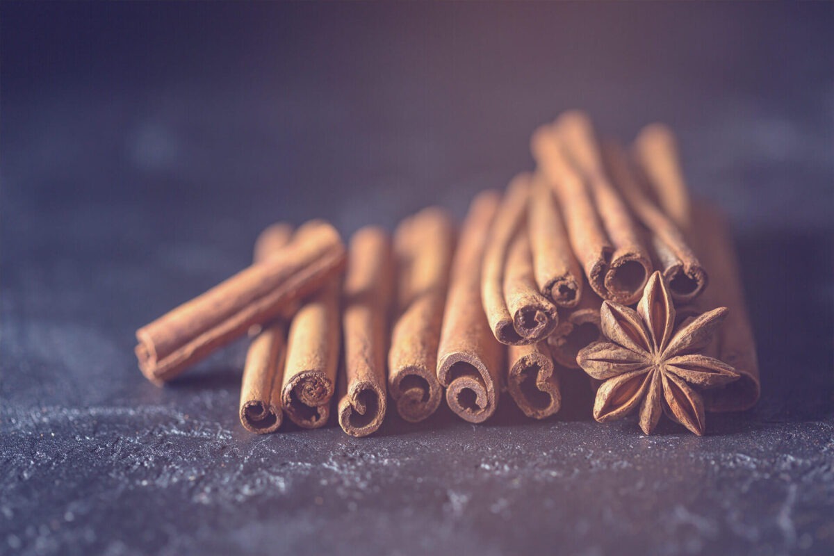 Cinnamon rolls on stone slab, only sharp in the foreground