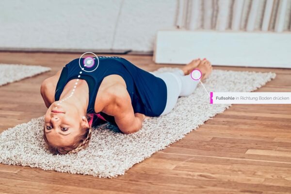 Kati doing the meridian yoga exercise fish for the conception vessel with stretch line drawn in