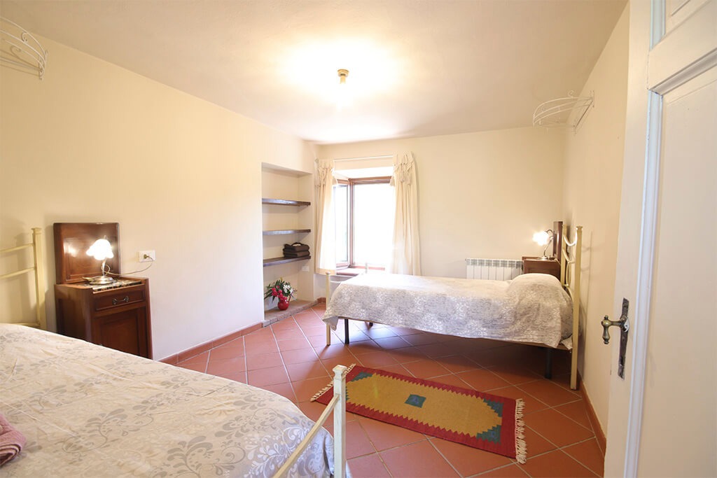 Habitación doble abuhardillada MAREMMA en la Villa Tibana